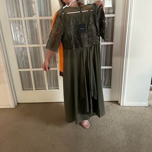 Olive green dress with lace sleeves and pockets!